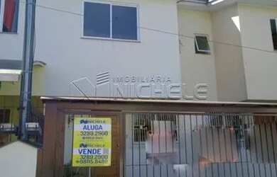 Imagem: A casa possui 3 Dormitórios, 1 Banheiro, 1 Vaga na garagem