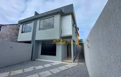 Imagem: A casa possui 3 Dormitórios, 3 Banheiros, 2 Vagas na garagem