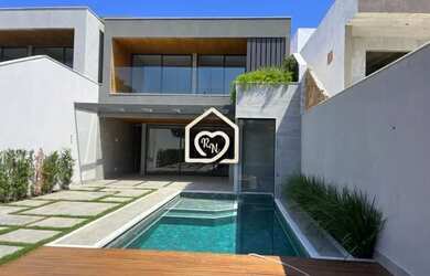 Imagem: A casa em condomínio possui 4 Dormitórios, 5 Banheiros, 2