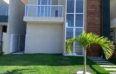 Imagem: A casa possui 3 Dormitórios, 4 Banheiros, 2 Vagas na garagem