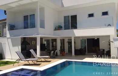 Imagem: A casa possui 5 Dormitórios, 5 Banheiros, 5 Vagas na garagem