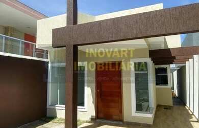 Imagem: A casa possui 3 Dormitórios, 1 Banheiro, 1 Vaga na garagem