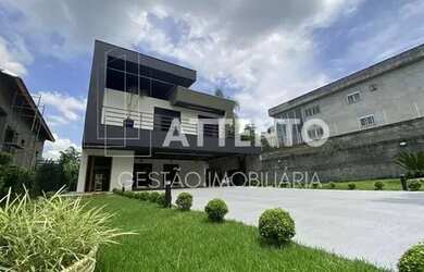 Imagem: A casa em condomínio possui 4 Dormitórios, 5 Banheiros, 5