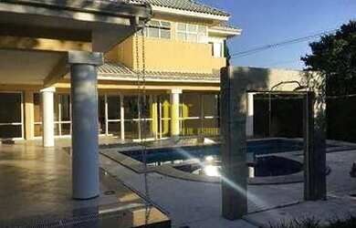 Imagem: A casa em condomínio possui 4 Dormitórios, 5 Banheiros, 4