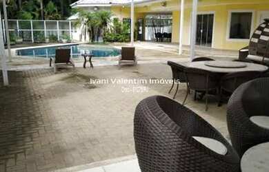 Imagem: A casa em condomínio possui 5 Dormitórios, 5 Banheiros, 3