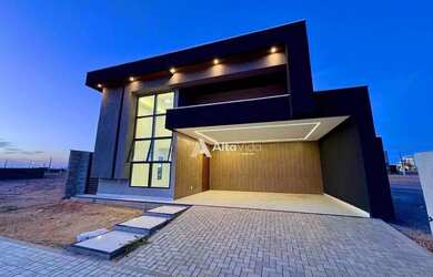 Imagem: A casa possui 3 Dormitórios, 2 Banheiros, 3 Vagas na garagem