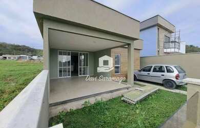 Imagem: A casa em condomínio possui 3 Dormitórios, 2 Banheiros, 2