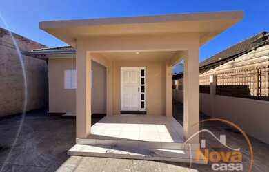 Imagem: A casa possui 3 Dormitórios, 3 Banheiros, 4 Vagas na garagem