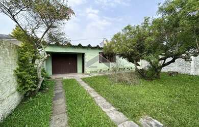 Imagem: A casa possui 2 Dormitórios, 1 Banheiro, 1 Vaga na garagem