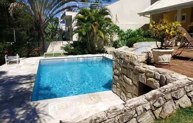 Imagem: A casa em condomínio possui 5 Dormitórios, 5 Banheiros, 4