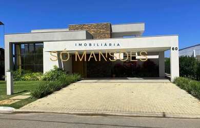 Imagem: A casa em condomínio possui 4 Dormitórios, 4 Banheiros, 5