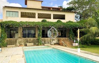 Imagem: A casa possui 4 Dormitórios, 5 Banheiros, 5 Vagas na garagem