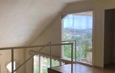 Imagem: A casa possui 3 Dormitórios, 3 Banheiros, 2 Vagas na garagem