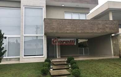 Imagem: A casa em condomínio possui 4 Dormitórios, 4 Banheiros, 5