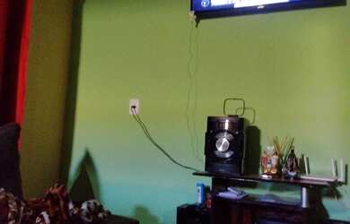 Imagem: A casa possui 3 Dormitórios, 2 Banheiros, 2 Vagas na garagem