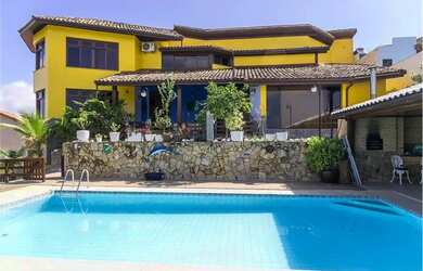 Imagem: A casa em condomínio possui 5 Dormitórios, 5 Banheiros, 5