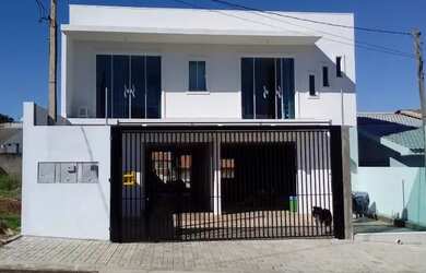 Imagem: A casa possui 3 Dormitórios, 3 Banheiros, 3 Vagas na garagem