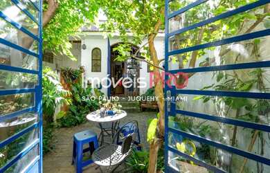 Imagem: A casa possui 3 Dormitórios, 4 Banheiros, 2 Vagas na garagem