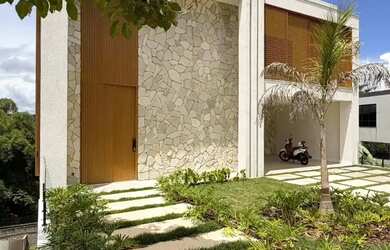 Imagem: A casa em condomínio possui 4 Dormitórios, 5 Banheiros, 4