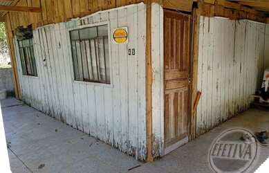 Imagem: A casa possui 2 Dormitórios, 1 Banheiro, 1 Vaga na garagem