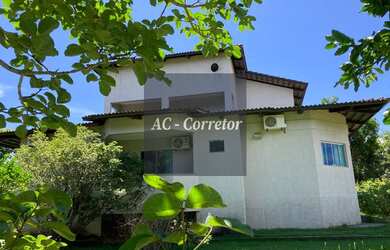 Imagem: A casa possui 4 Dormitórios, 5 Banheiros, 4 Vagas na garagem