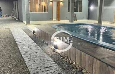 Imagem: A casa possui 4 Dormitórios, 1 Banheiro, 4 Vagas na garagem