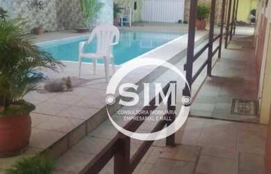 Imagem: A casa possui 4 Dormitórios, 1 Banheiro, 4 Vagas na garagem