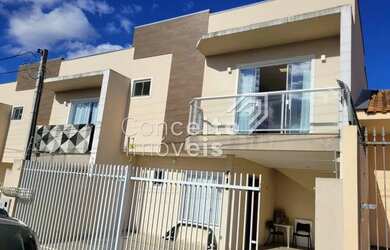 Imagem: A casa possui 3 Dormitórios, 3 Banheiros, 2 Vagas na garagem