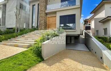 Imagem: A casa em condomínio possui 4 Dormitórios, 5 Banheiros, 5