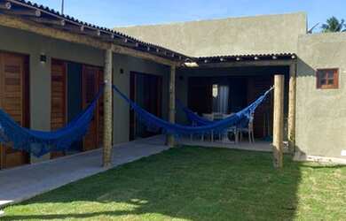 Imagem: A casa possui 5 Dormitórios, 5 Banheiros, 2 Vagas na garagem