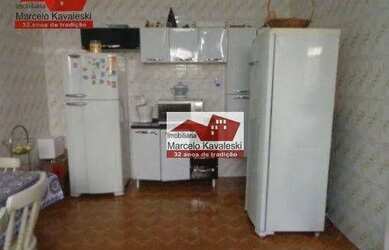 Imagem: A casa possui 3 Dormitórios, 2 Banheiros, 2 Vagas na garagem