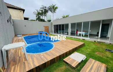 Imagem: A casa possui 3 Dormitórios, 3 Banheiros, 5 Vagas na garagem