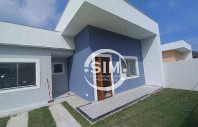 Imagem: A casa possui 3 Dormitórios, 1 Banheiro, 2 Vagas na garagem