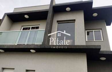 Imagem: A casa possui 3 Dormitórios, 5 Banheiros, 4 Vagas na garagem