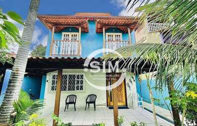 Imagem: A casa possui 4 Dormitórios, 2 Banheiros, 3 Vagas na garagem