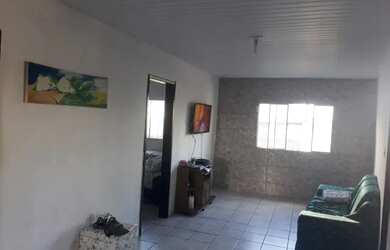 Imagem: A casa possui 2 Dormitórios e 1 Banheiro e está localizado