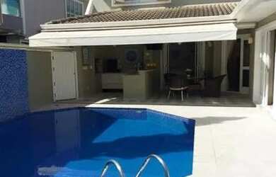 Imagem: A casa em condomínio possui 4 Dormitórios, 5 Banheiros, 4