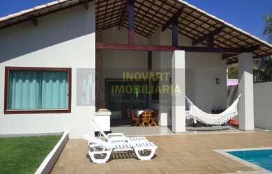 Imagem: A casa possui 3 Dormitórios, 2 Banheiros, 3 Vagas na garagem