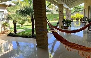 Imagem: A casa em condomínio possui 4 Dormitórios, 5 Banheiros, 5