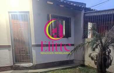 Imagem: A casa possui 2 Dormitórios, 1 Banheiro, 1 Vaga na garagem