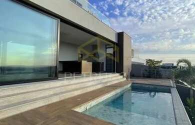 Imagem: A casa em condomínio possui 4 Dormitórios, 5 Banheiros, 4