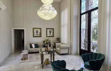 Imagem: A casa possui 4 Dormitórios, 5 Banheiros, 3 Vagas na garagem