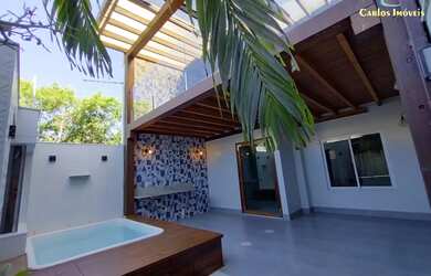 Imagem: A casa possui 4 Dormitórios, 3 Banheiros, 2 Vagas na garagem