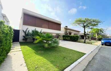 Imagem: A casa em condomínio possui 4 Dormitórios, 5 Banheiros, 5