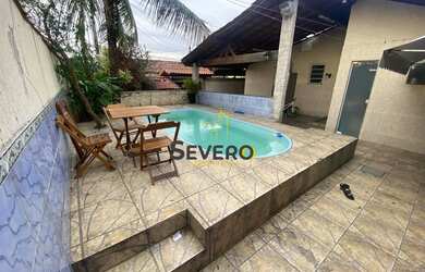 Imagem: A casa possui 2 Dormitórios, 3 Banheiros, 2 Vagas na garagem