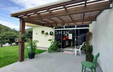 Imagem: A casa possui 2 Dormitórios, 1 Banheiro, 3 Vagas na garagem