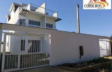 Imagem: A casa possui 2 Dormitórios, 4 Banheiros, 2 Vagas na garagem