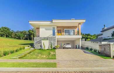 Imagem: A casa em condomínio possui 3 Dormitórios, 5 Banheiros, 2