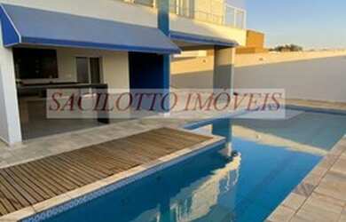 Imagem: A casa em condomínio possui 5 Dormitórios, 5 Banheiros, 4