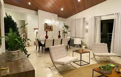 Imagem: A casa possui 3 Dormitórios, 5 Banheiros, 5 Vagas na garagem